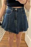 Simple and cute. Waist doesn't have stretch so I'm glad I went with the medium. The small would not have fit me. The only thing I don't love is how long the zipper is on the front. It kind of bunches a little and is very prominent. Worth it overall for the sale price. - Holly R.