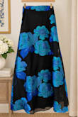 The dress is beautiful and fit perfectly. I am 5'4 and with heels, the length was great too. I am disappointed in the overall cut of fabric I received for my dress. Unlike the dress on the model, where the top is fully black, my fabric cut has a small portion of blue flowers. Upon noticing this, I looked at the other review pictures and noticed that there seem to be 3 fabric cuts: 1 with black on top, 1 with a small amount of blue, and 1 with a large amount of blue. Unfortunately, the small amount of blue looks the least intentional and is my least favorite of the fabric cuts. I thought about ordering a second dress in the hopes that I would receive a different fabric cut, but not sure I am willing to pay for expedited shipping and a return fee. I understand that fabric cuts are going to vary and won't always exactly match the photo on the model, but I do think this particular cut should not be included, as it does not meet my style expectations based on the model photo. - Megan B.
