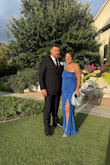 I wore this dress to a wedding, and it was perfect. Loved the color so much. Got a ton of compliments. I had the bottom hemmed a little because I am 5'4", and I had the slit cut a little bit higher to show a little more leg. Fit and color was great! - Renae S.