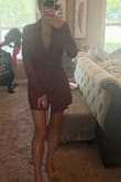 This dress is so good! Probably one of my favorite dresses. I've gotten from Lulu's; it's true to size and it looks so cute with boots for fall. It has a little stretch to it. - Sarah W.