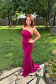 This dress is beautiful. The top corset type part was really nice and fit well and the color is amazing. The mid section fit great and didnt feel too snug on the belly. I did need to pull it up a little throughout the night but can be expected with strapless. - Shelley B.