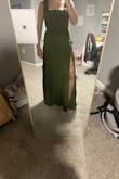 Really pretty, comfortable dress. Great quality too. Fits great in all places except the straps are too long. Not sure if I'll even be able to go get them shorter because of the ruffle that's attached to it. It may look weird if I were to go have it taken in. Tricky because it fits me well, so if I went a size smaller, I'm sure it wouldn't zip anymore but I wish the straps were better fitting. - Meaghan L.