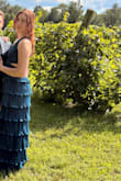 Hugs me in the right spots. I am small chested and this dress almost pushes the girls up. I have received so many compliments on this dress; I will get it in another color. - Klaudyna G.