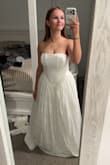 I am having a reception party for my elopement and had a tough time finding a cheap dress that was still stunning, and she checks all of the boxes! The material feels so amazing! I am so excited to wear it for my party! I'm a bit larger in the bust, so I sized up to a M, and it's great! I will say the tie for the corset back feels a little cheap, but we will see how it holds up! - Katelyn V.