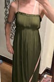 The bust fit super weird; it was flat in the front but puffed out on the sides (unevenly might I add), and you can only tie the dress tighter above the boobs, not below, which pushes them down and makes me look like a chimney. The quality is horrendous; I could've gotten a burlap sack that was better made and cuter to wear. I feel nothing but rage for this worthless green scrap of cloth that I will now have to wear to my dad's wedding. Thank you, Lulus, for promising me a lifetime of staring at pictures where I look like a disfigured linebacker. I hope the designer who made this dress gets what they deserve. - Georgia O.