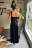This dress is beautiful. The neckline is awesome, and the velvet fabric is gorgeous. But the lace up tie in the back is a thick piece of velvet fabric and that's not it! The tie needs to be a high-quality ribbon or cord or anything besides a clunky piece of thick velvet! It's too hard to tie and it won't stay tied AND it hurts your back when you're leaning back in a chair and there's a massive velvet knot digging into your back. Fix the tie fabric, and this dress is a 10/10! ( - Hunter M.