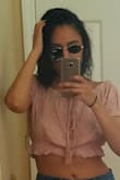 This top is so cute. It is the right length. The material is a bit see through but I actually like that. Otherwise probably best to wear a strapless bra. - Georgianna G.