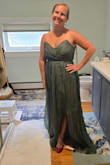 Overall, I honestly was not impressed. The color was stunning, however. I ordered a small based on the recommendations from my measurements and had to send that back for a med. The med zipper was sooooo hard to zip. The fabric looks nice, but it doesn't feel nice; the boning at the bust poked in at the top and bottom. It was just too uncomfortable to wear. - Elizabeth R.