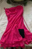 The color in the photo looks much lighter. It's fully hot pink. I still like the dress, but it didn't come as intended. (Color was supposed to be like the inside on photo 2) - Ava S.