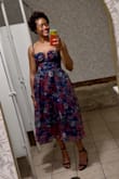 I loved this dress so much. It was very comfortable. Felt like a glove. I didn't even realize it had pockets until I got it, which was a nice surprise. Wasn't too thick and stuffy either. - Gabby B.