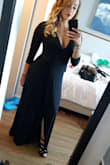 The material is super soft and hugs your body in all the right places. Classy, yet sexy. You can't really see the slit unless you want to show it. It was kind of long, even with 3.5 in heels, wish they made a shorter version for us girls that are vertically challenged but over all I LOVE this dress. Would recommend. - Kathryn A.