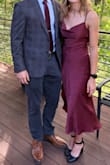 Great dress!! Doesn't have any stretch, so don't size down for a tighter fit. I wore it to a wedding and loved it - Audrey W.