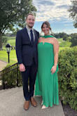 I wore this dress for my friend's wedding in September, and I got soooo many compliments. I was worried that this dress was going to be unflattering on me because I'm a bit of a bigger girl and am curvy, but it fit like a glove and was sooo comfortable. This dress was loose fitting but not baggy. Definitely recommend! - Erin M.
