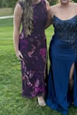 I loved this dress! It has a fun pattern that is totally different than anything I own. It is super elegant. Highly recommend for a formal wedding. I was warm enough despite it being a thin material and only 50ish degrees by the end of the wedding. - Micaela A.