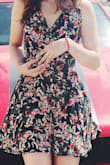 This is one of my favorite dresses! It's super high quality and the colors are rich and super flattering. The open back is a cute little detail. Would definitely recommend getting this one. I got it in a size S and it fit perfectly. - Tania M.