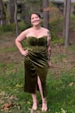 I fell in LOVE with it online. I ordered a large, but they shipped me an XL, and they immediately sent me a replacement with overnight shipping. The right one came, and it was magical! I felt like a million bucks, and I got the best compliments all night from the women and all the stares from the men! I did wear Spanx because I'm self-conscious about my sudden weight gain and bloating. But it is a ribbed type corset inside. I'm not sure I even felt this good in my own wedding dress, if I'm being honest!! Just buy it. Trust me..... - Roxanne P.