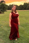 I'll start off by saying that this dress is definitely for tall women. I'm 5'9 and wore heels, and I was still tripping over the dress. So shorter women will likely need to get it shortened. But the dress drapes beautifully. I felt so regal in it. And it hugged all my curves. I got so many compliments. Fantastic fall wedding guest dress! Additionally, I'm 13 weeks pregnant in the photo, and the dress is stretchy enough that I could fit in. - Madeleine L.