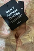 my dress arrived damaged without zipper & seam was coming apart. - Sheena S.