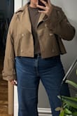 I was on the hunt for a cute fall, cropped trench coat. This item seemed like a good option because of the image. However, the fabric is simply polyester and thin. It would not serve the trench coat purpose as it is built for aesthetics rather than functionality. So, if you're looking for functionality, this is not for you. - Angelica T.
