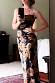Gorgeous dress, perfect for a cocktail or semi-formal fall wedding. Fabulous value. I chose to tape rather than use a strapless bra, I think that gave me a bit more control, and I used some tape to fix the cowl in place to avoid any wardrobe malfunctions on the dance floor. It runs v. true to size, perhaps even a bit small, but not enough to size up unless you do prefer a looser fit- esp. on the hips and tummy. Do keep in mind, sizing up will make the cowl looser. Overall, loved it! - Grace M.