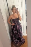 I loved the dress so much! The pattern is really pretty. I wanted something floral to wear to a fall/winter wedding. I'm 5'3", so I'm a little bit on the shorter side and had to have it shortened because I wanted to wear a low heel. The photo shows the dress before I had it shortened. I got a lot of compliments on this one. - Laura C.