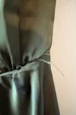 Came with loose strings and loose stitching in the back, super wrinkly. Really upset with the quality. - Amy H.