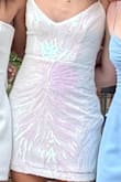 This dress was purchased for my daughter's homecoming. The dress fit perfectly. She is on the thinner side. We ordered the small and medium because other reviews mentioned that the dress ran small. I felt that the dress was true to size. My daughter is 5'7" and weighs just over 100 pounds. The small was the right size for her. It was a fun party dress, and she felt comfortable in it. She was not pulling on it to stay up, and the dress did not ride up on her legs. The shimmer and "color" of the sequins made it versatile to go with any color shoes and jewelry. I highly recommend it. - Valerie L.