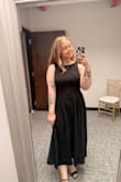 This dress is fantastic and will remain a staple in my closet. Everyone needs a plain black dress, and this one is perfect and comfortable. I did size down to a medium and recommend you do too. It has a stretchy material, so it is still pretty forgiving. - Ellen H.