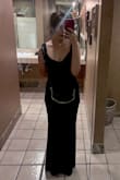 I wore this for my husband's work dinner and it was lovely! It has a wonderful balance of having old Hollywood glamour while still being a modern dress. I couldn't help but pair it with a back necklace that went all the was down my spine and ended just before the lower back of the dress. Absolute perfection.
I paired her with a nice set of pasties and clothing tape. I found the tape essential for keeping this straps in place and not slipping around, which it wants to because the fabric is a decent weight.
I sized down due based on recs. I'm glad I did for my IBTC membership was already struggling with a smaller size. If I would have gotten my normal size, I might have been able to wear *some* level of shape-wear, but I'm not sure. When I tried some on, the seams of the undergarments were extremely visible through the dress. No points knocked because I think it's just the nature of the fabric, but be prepared to wanna go commando. - Amelia T.