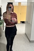 Got this for a concert and I love it! I personally wish I ordered a size up so it wasn't as tight, but still super cute. - Megan P.