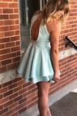 This dress is so cute and flattering. I might get it altered because my torso seems to be slightly too short so it puffs out a little in the back. So if you are taller it will be a perfect fit! It's slightly longer in the back too so perfect for a short dress. - Rochelle G.