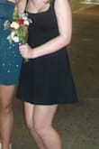 I loved this dress! It was the perfect outfit for homecoming. It was casual and yet so classy. It was a little loose on the straps for me since I have a shorter torso. Though this dress was perfect, I loved spending every second in it. I would just keep in mind that if you have a shorter torso, the straps are going to be a bit loose. I did use some clothing tape so my straps didn't keep falling down, and it worked for the entire night. - Karina U.
