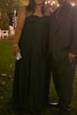 I very much enjoyed wearing this dress. The material is heavy and looks expensive. I love the deep emerald color. Definitely worth the price. I got a lot of compliments throughout the night. Only thing I would change is the length. I had to pay to get it hemmed 5 inches to wear with heels. - Nelly V.