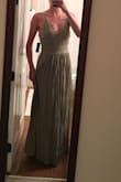 Can't wait to wear this to the wedding I ordered it for. Fits perfectly, neckline has a moderately deep V but adjustable straps can change this. Fabric is light and flowy but not cheap. I ordered the green color, totally true to photos. Looking for an excuse to order in more colors. - Chelsea R.