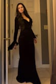 Beautiful dress! Got a size Medium and it's perfect, thick material definitely warm for an outside New England wedding in the fall. I have an appointment to get the dress altered to take off the cuffs (they give costume vibes) and I'm going to have the shoulders taken in because they definitely fall down if you have a smaller chest. - Tina D.