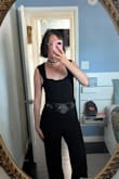I don't usually leave reviews, but I just had to because it's SO HARD for tall, pear shaped ladies to find jumpsuits that fit. This has a good amount of stretch and hugs you in all the right places. I don't usually feel super confident with my body in clothes, but for whatever reason this one had me feeling AMAZING. If you're like me (5'10, 155 pounds, relatively flat chested with a big butt, wide hips, and a tummy), this is the jumpsuit for you! You'll be feeling so confident, trust me! 

Since it's relatively plain, it's also really easy to dress up or down or wear to different events.  

The only negative is that it's hard to zip and unzip on your own. So just make sure your +1 is available all night to unzip slightly whenever you need to go to the bathroom. = - Stephanie F.