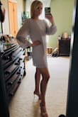 I feel very dressed up and classy in this dress. It's very light for the warmer days. It looks very cute despite it having a lot of room and I love the fact that it's of good quality and not see through. You could probably get away with wearing leggings too for a colder day. I recommend this dress. - Sharla H.