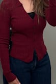 A little on the fitted size, but I think sizing up would be too big (also wearing a long-sleeve underneath).
The fabric is pretty stretchy. Not the warmest, but more of a fashion cardigan. Excited to wear for cute fall activities! - Aman S.