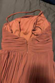Elegant design and quality is great but can't close the zipper all the way on my rib cage area. Tight on my chest for 32A bust size. - Jocelle D.