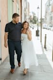 This dress is one of my favorite purchases! I originally ordered the dusty blue for a wedding and received several compliments! When I was panicked for my engagement shoot, I ended up ordering the same dress in white and it couldn't be more perfect. The bust is a bit tighter than I would prefer, but not a dealbreaker. The fit is very flattering and elongating. I'm also 4'11, so this was ankle length for me. Love it! - Anna L.