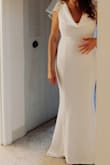 I loved this dress! I needed something simple but elegant, I'm petite but busty so the fabric was perfect because it stretches a bit, the shape is really flattering, it was a bit too long for me so I had to adjust the seam but I'm also kinda short. It was perfect for what I needed. - Agni M.