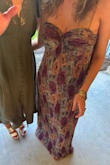 I ordered one size up for more coverage on the chest, which worked but it was too loose. I ended up sewing the dress into a strapless bra to give it shape since I didn't have time to get it altered. As a tall girlie, I love the length of the dress. I was wearing 4" heels and the dress was a little longer than floor length. - Lauren N.