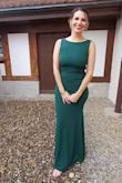 I was nervous about ordering online without trying it on, but it fit beautifully. I wanted something simple and modest for a religious wedding, yet still special, and the back detail was incredible! All I needed were earrings, a bracelet, and a ring to complete the look. The dress made me feel like a model! It's fully lined, which was perfect for a wedding in Switzerland because it helped keep me warm. The fabric also looks and feels high quality. So happy with my purchase! - Regina A.