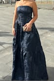 This dress is beautiful! If you have a bigger chest, you'll have to size up. I'm normally a M in dresses. This M was very tight. I sized up and then the L was way too big on top. After alterations it fit perfectly! That being said, the dress is worth it for the quality and price. - Olympia H.
