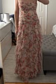 I'm usually not a fan of strapless dresses, but this dress fit perfectly. It was comfortable, and I received a lot of compliments. It's a slim top fit with the ruffles on the bottom, making it super comfortable! - Adrienne S.
