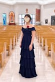 I really love this dress! The quality is great, and the navy color is beautiful. I ordered a size small, and the little bit of stretch makes it comfortable and easy to wear. The pleated, tiered style is super flattering and does a great job of hiding my tummy.

I'm 5 feet tall, so it was too long for me and needed to be hemmed. I was even luckier to buy it during a promotional sale, so I'm really happy with my purchase, especially for the price, quality, and style. Other than the length, I loved everything about it! I wore it to a family wedding and felt great. I'd definitely recommend this dress! - Thao T.