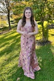 I loved this dress; I ordered both the XL and the XXL. The XL fit perfectly; I normally wear a size 12/14. If you have a larger bust (over DD), I would suggest sizing up to an XXL. I felt so pretty; it has a very romantic, flattering silhouette. I got a ton of compliments - McKayla W.