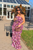 Bought this dress in purple for a fall wedding and loved the color and fun print. Length was perfect with a kitten heel. The bust was a bit snug, but kept anyway and thought it worked out nicely! The pleats and ruffles were very flattering. Received lots of compliments on it. - Hannah M.