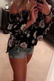 This top is one of my summer favorites, the opening in the back makes it extra flirty and the elastic on top holds it in place pretty well. The material is soft and I get compliments every time I wear this out! - Christina D.