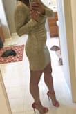 This dress is a thin stretchy material that feels great on and looks perfect with some black ankle strap heels. I love that the high neck and sleeves are modest but the tighter fit and short length balance it out. Great dress! - Nicki R.